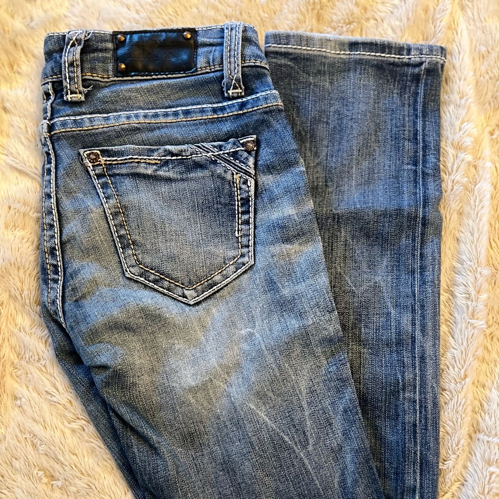 Buckle, black blue jeans